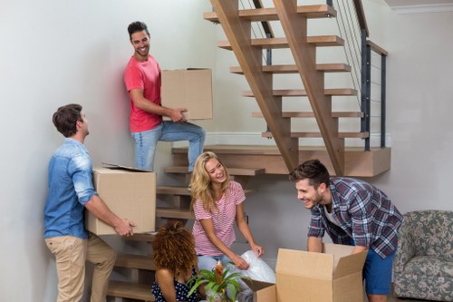 House removalists preparing a Forest Hill home move with furniture and boxes