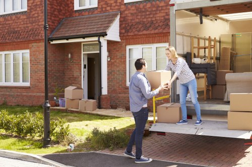 Moving team handling items safely at the start of a van service