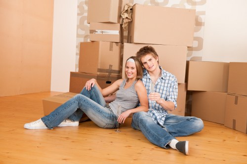 Moving van service with safety-focused team preparing items for transport