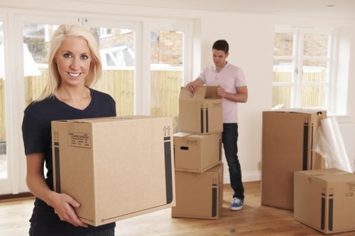 Professional movers loading furniture into a truck