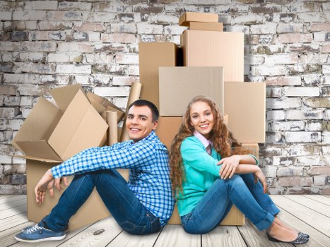 Packing boxes and moving equipment prepared for a Forest Hill relocation
