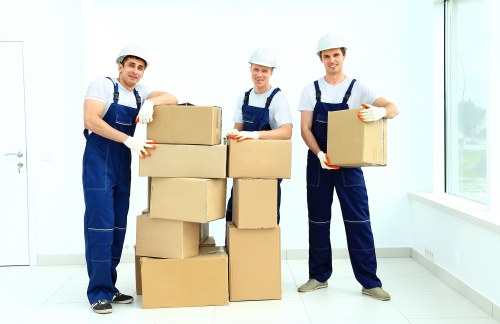 Furniture pick-up service helping with bulky items in a Forest Hill home