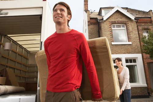 Commercial removal service preparing office equipment for transport in Forest Hill
