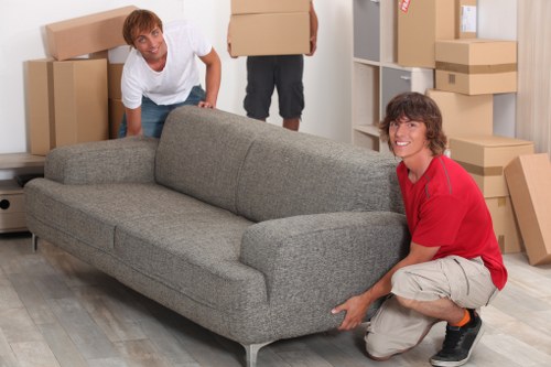 Packed boxes and wrapped furniture ready for a local house move