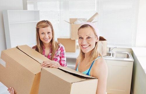 Commercial moving team handling office furniture and equipment in Forest Hill